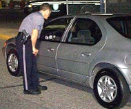 Cop at the car window