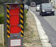 Red spraypaint on French speed camera