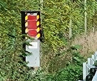 French speed camera painted red